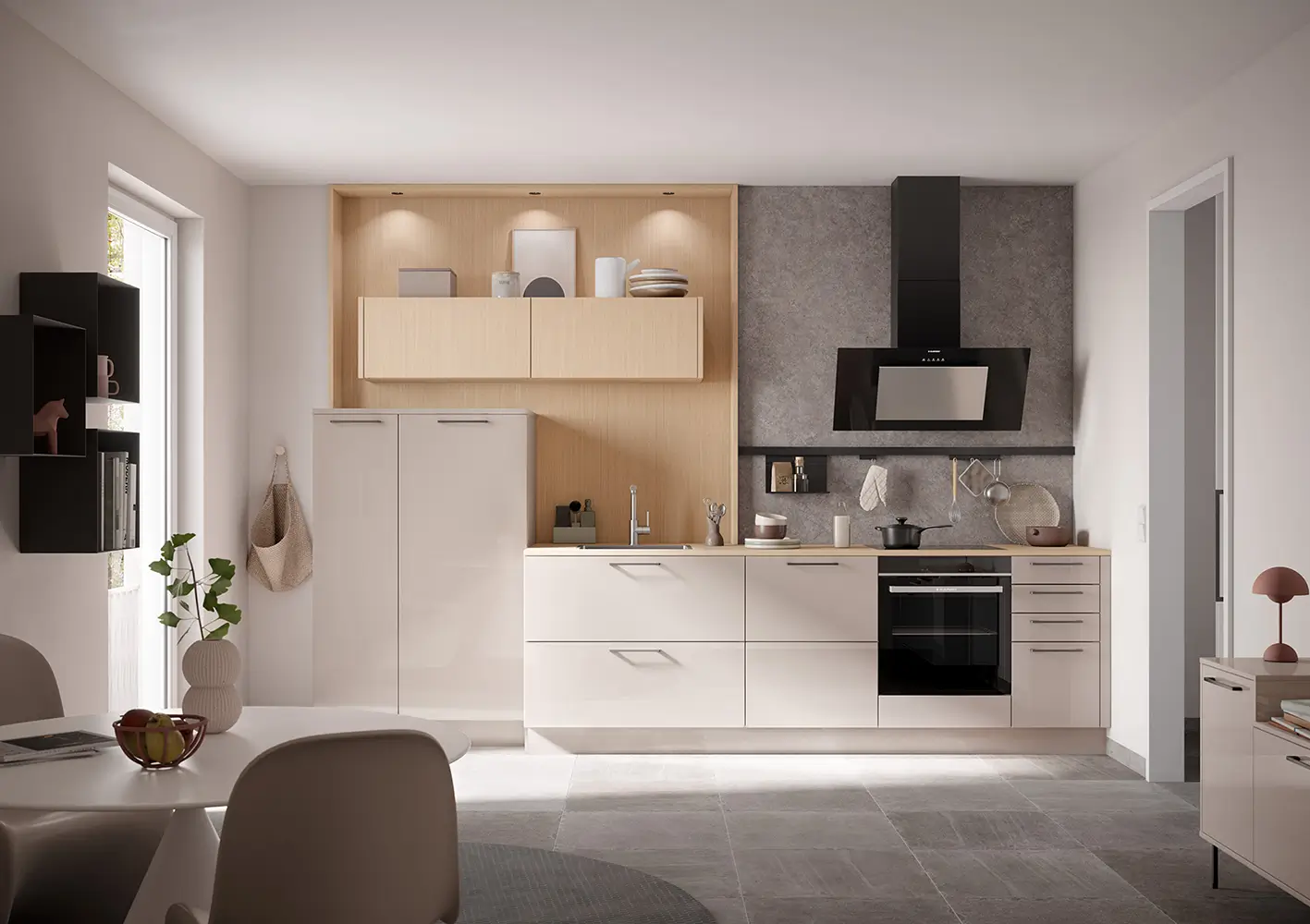 Petite cuisine moderne blanche et bois avec hotte noire design et façades lisses.